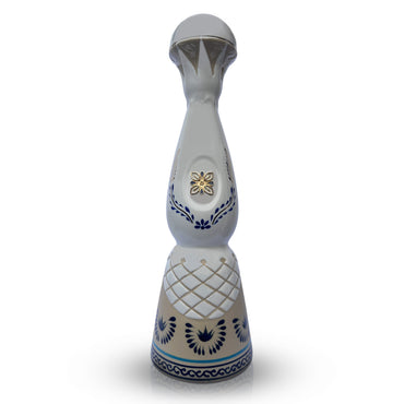 White ceramic, hand designed bottle containing 700ml of Clase Azul Reposado tequila.