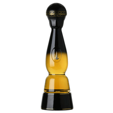 A striking gold colored 700ml bottle containing Clase Azul Gold edition of tequila, aged in oak barrels.