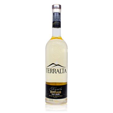 A clear glass bottle containg 750ml of light straw coloured Terralta Reposado tequila. The bottle is elegantly presented, reflecting the brand's commitment to quality. Its minimalist design showcases the iconic Terralta logo. Each bottle is hand-numbered.