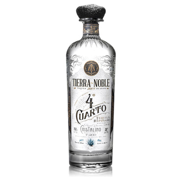 Clear glass bottle containing 750ml of Tierra Noble Reposado Cristalino Edition 4 Cuarto tequila.